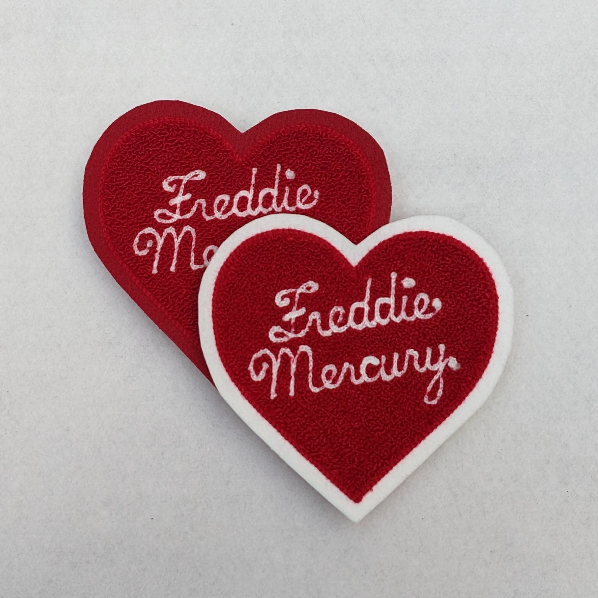 Freddie Mercury chenille patch. Moss stitch on scrim felt heart.