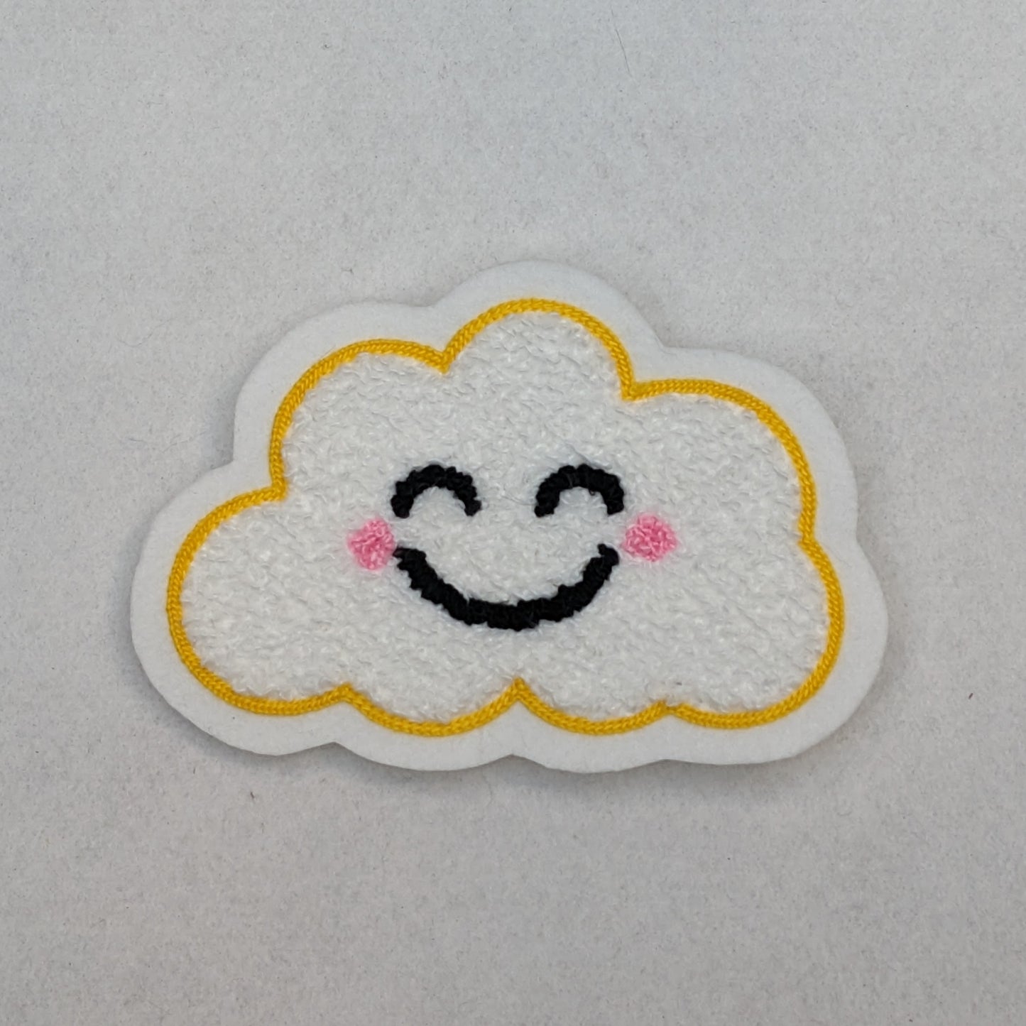 Cute fuzy chenille patch of a happy cloud. Kawaii style patch.