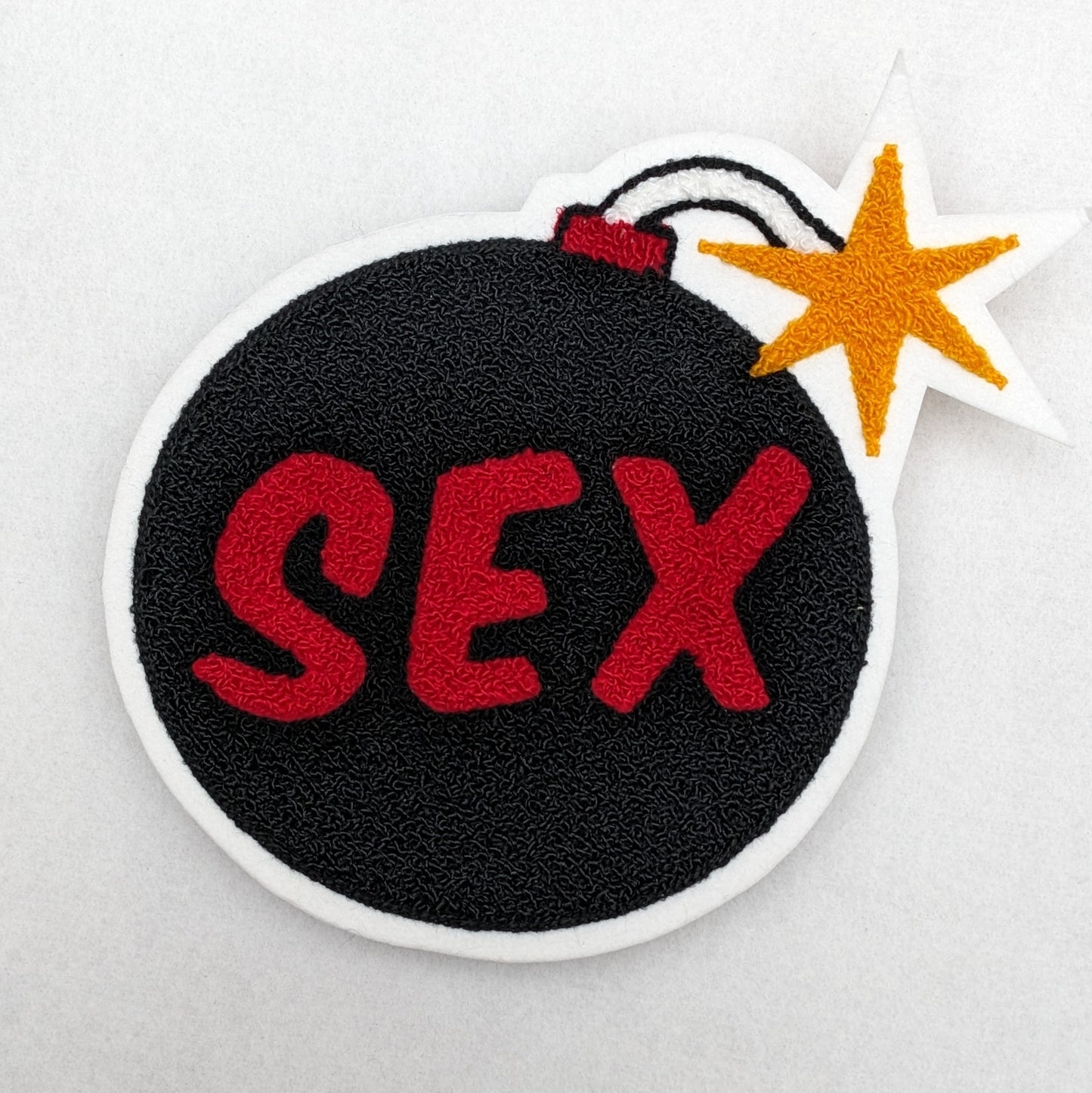 Large Sex Bomb Chenille Patch - Moss Stitch on Felt Backing
